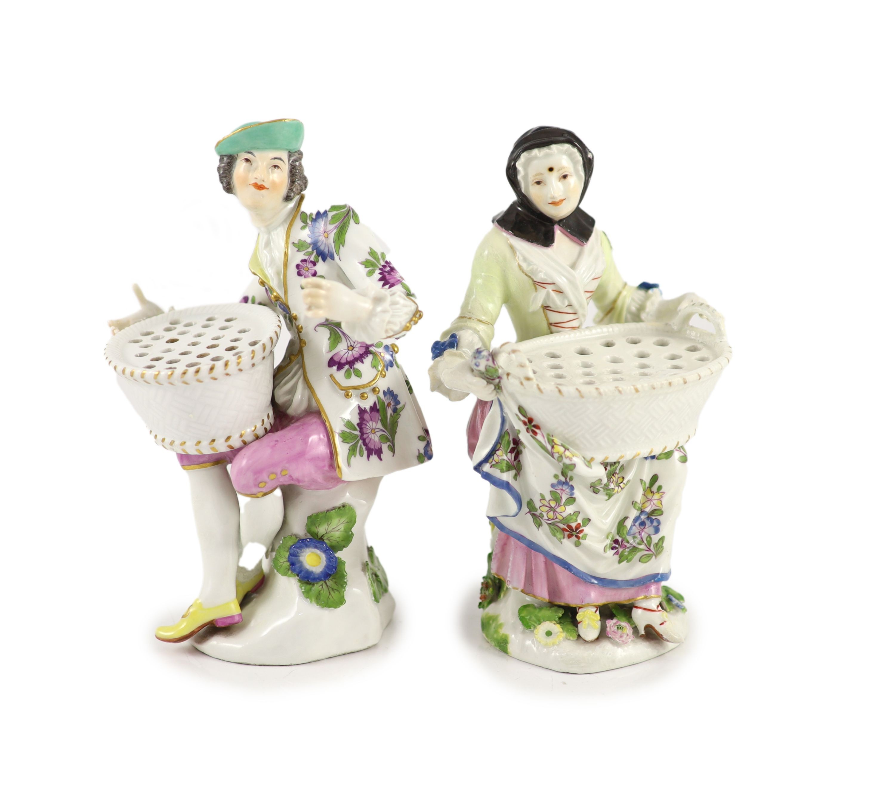 A pair of Meissen figural flower holders c.1755, 20cm and 19.5 cm high, restoration